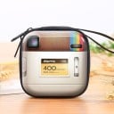 Small tin case for small items with colourful print Sturdy metal box with zip and cord loop Compact size 7 x 7 x 3 cm 21