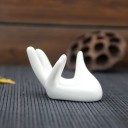 Soporte para huevos con forma de mano 2
