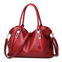 Spacious women's shoulder bag 32 x 27 x 10 cm made of artificial leather Two handles and a long strap Golden metal embellishments Metal feet 5