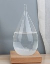 Stormglas in druppelvorm Weerindicator op basis van kristallen in de vloeistof Glazen decoratie met houten voet 12 x 6 cm 1