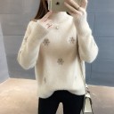 Suéter de mujer con copos de nieve. 4