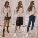Suéter holgado de mujer con bolsillos y botones. 2
