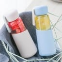 Szklana butelka podróżna na wodę 400 ml Silikonowa osłona dla wygodnego uchwytu Zatyczka z uchwytem Wymiary 19,8 x 7 cm Na wodę 6