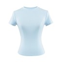 T-shirt ajusté à manches courtes pour femme Encolure ronde simple Haut élastique élégant pour une tenue décontractée T-shirt slim à la mode 12