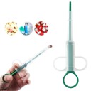 Tablet Applicator for Small Animals A tool for administering capsules and liquid medications Plastic dispenser with plunger and finger grips 2
