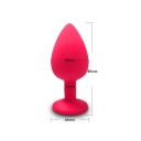 Tapón anal de silicona rojo talla L con piedra transparente extraíble, ideal para diversificar con estilo los momentos íntimos. Embalaje discreto. 2