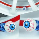 Tappi per valvole a forma di occhio 4 pz Accessorio decorativo per le ruote dell'auto Bianchi con venature rosse e iride blu Plastica ABS e rame 3
