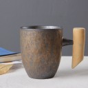 Tazza in ceramica con manico in legno 7