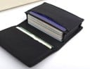 Travel Case for Documents and Cards Folding Design with Spacious Compartment and Pocket Genuine Leather in Black Dimensions 10.5 x 7.5 x 2 cm 1