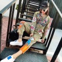 Tuta da donna con immagini e scritte A2046 1