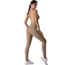 Tuta sportiva da donna con spalline e schiena scoperta e leggings con zip nel décolleté tuta fitness monocolore in nylon 15