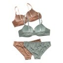 Två damunderklädesset i beige och mintgrön färg, varje med push up-bh och trosor dekorerade med en liten rosett 5