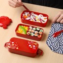 Two-tiered bento food box with partition Lid with floral pattern and side clips Capacity 750 ml Made of plastic 16.8 x 8.3 x 7.4 cm 7