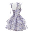 Vestido mini de malha para senhora com alças e laços e corpete com cordão nas costas em azul e branco com padrão floral 2