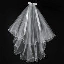 Witte tule trouwsluier met strik en pareltjes Laagjes elegante sluier voor vrijgezellenfeest Bruidsfeest haaraccessoire 2