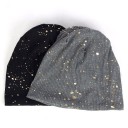 Women's beanie hat with golden drops Modern loose model made from finely ribbed fabric with a predominance of cotton Head circumference 54 to 59 3