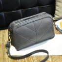 Women's crossbody bag with multiple zip compartments Decorative stitching Strap with metal carabiners PU leather and polyester 25 x 15 x 3