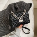 Women's crossbody handbag with a flap made of PU leather Diamond quilted design Chunky chain as a handle Metal fastening Dimensions 23 x 16 2