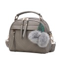 Women's Handbag for Carrying by Hand or Over the Shoulder Decorative Pom-Poms with Leaf V-Shaped Stitching Front Zip Pocket Rounded Shape 3