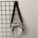 Women's small canvas crossbody bag with a sheep motif Front pocket with zip Black adjustable strap with carabiners 15 x 16 cm 1