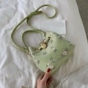 Women's small crossbody bag in the shape of a pouch with floral embroidery Short handle and long strap PU leather and polyester 17 x 17 x 3