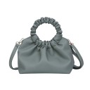 Women's small handheld handbag made of artificial leather with a gathered round handle Removable adjustable shoulder strap Golden hardware 21 x 4