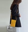 Women's vertical crossbody handbag with front flap Minimalist flat shape Thin strap with buckle Smooth PU leather 13 x 19 x 3.5 cm 4