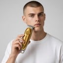 Zastrihávač vlasov a brady pre mužov Dokončovací strojček Celokovový 16 x 4 cm 1400 mAh Výdrž 180 minút 3 hrebene 1–3 mm Na kontúry 7