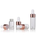 Zestaw 10 szklanych butelek 5 ml z kroplomierzem. Zakrętka w kolorze różowego złota. Opakowanie na serum, olejki eteryczne lub ekstrakty. 2