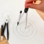 Zestaw kompasów z mikroołówkiem i zapasowymi ołówkami w etui Kompas szkolny do rysowania z zapasowymi wkładami i przezroczystym etui 12 x 2,5 cm 3