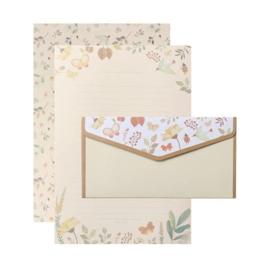 Sats av brevpapper och kuvert 14 x 21 cm 6 st papper 8,5 x 16,5 cm 3 st kuvert blommor blad fjärilar krämfärgad skrivset