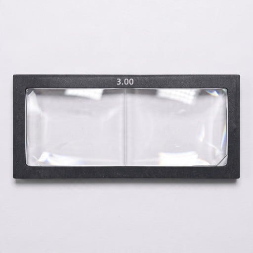 Lupa dioptrica para capacete de soldadura 3 dioptrias Dimensão 11 x 5,5 cm Espessura 3 mm Vidro Moldura preta Para soldadura precisa