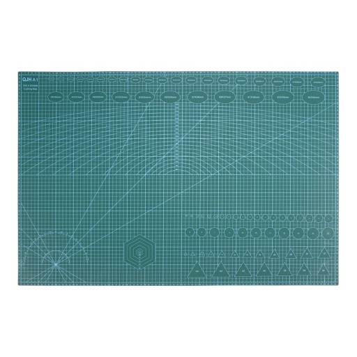 Skæremåtte A1 90 x 60 cm dobbeltrettet selvhelende i PVC med en tykkelse på 3 mm grøn med gitter og skabeloner til arbejde med læder og papir