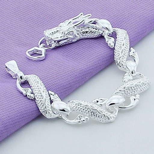 Kvinnors massivt armband med en kinesisk drake