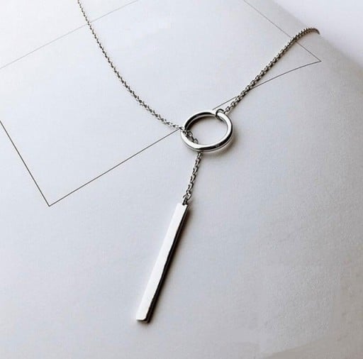 Damhalsband med en cirkel och en stång