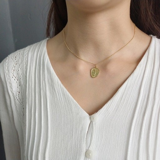 Damhalsband med ansikte