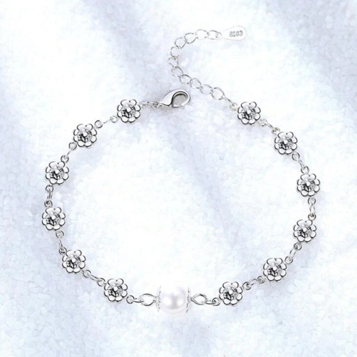 Damarmband med blommor A2441