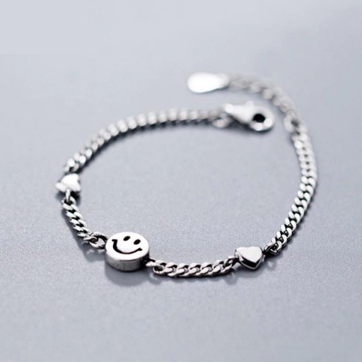 Damarmband med smiley face och hjärtan