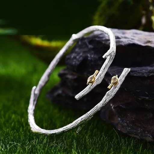 Kvinnors öppet armband med fåglar
