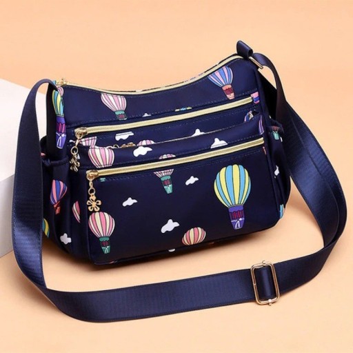 Dam crossbody-väska med tryck och flera fickor med dragkedja Justerbar bred rem Oxford- och polyesterstoff Mått 27 x 20 x 10 cm