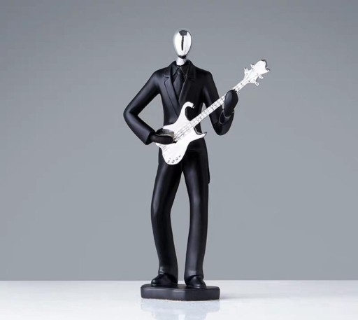 Dekorativ staty av en musiker