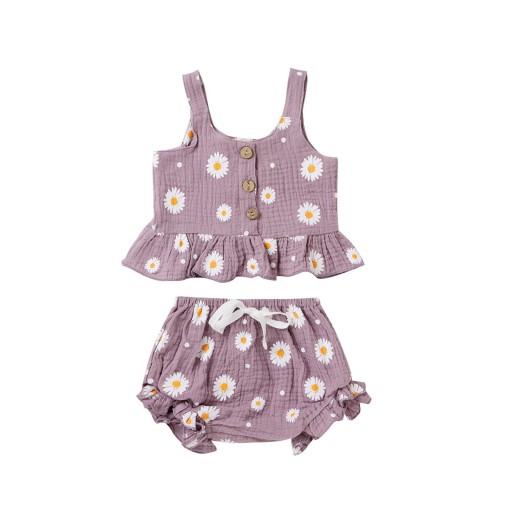 Tjejtopp och shorts med blommor