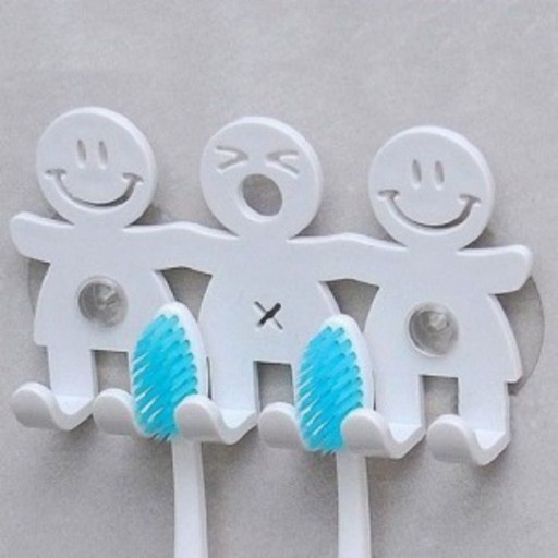 Tandborsthållare med figurer