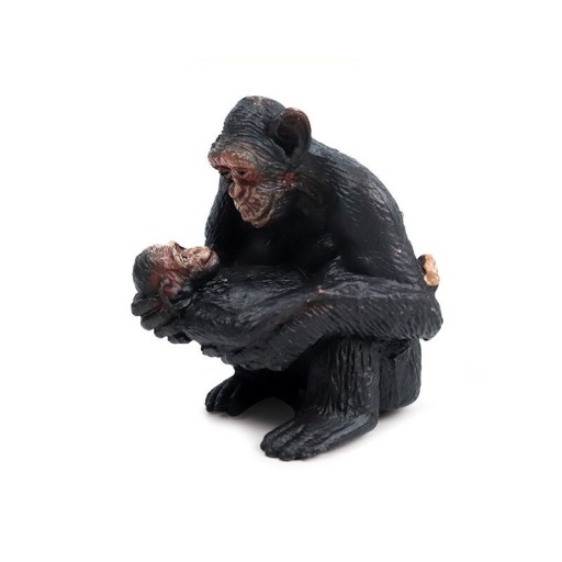 Schimpans och babyfigur