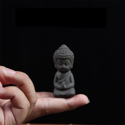 Ler Buddha staty