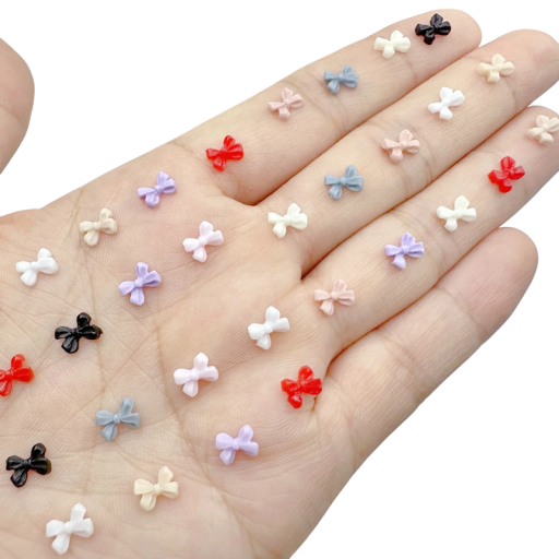 50 stuks 3D strikken voor nagels 6x6 mm Kleurrijke hars mini linten Nagelversiering Transparante accessoires Glanzend iriserend effect DIY decoraties