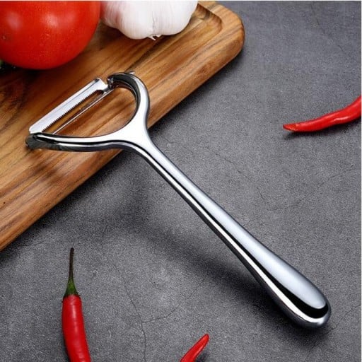 Rostfri skrapa med tandade blad