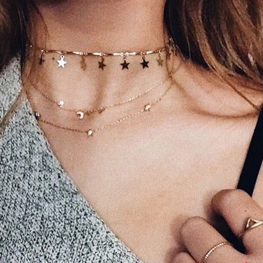 Guldpläterad choker med stjärnor