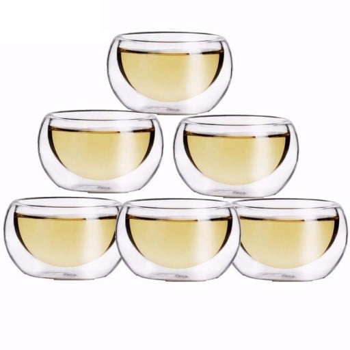 Set med 6 tekoppar i glas
