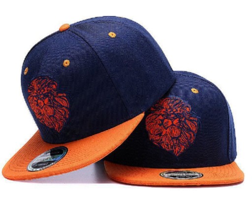 Snapback med lejontryck - Blå-orange